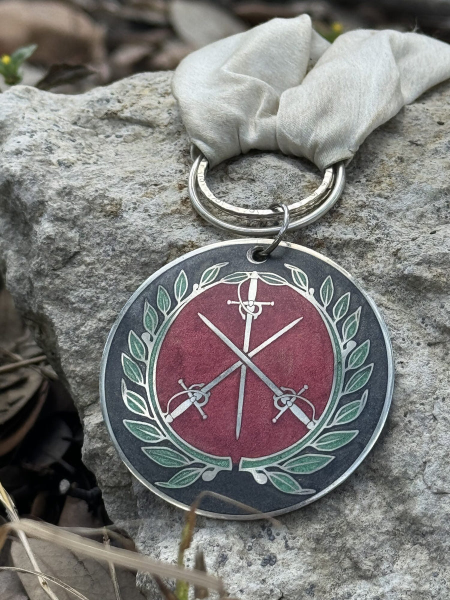 Order of Defense medallion in a laurel wreath