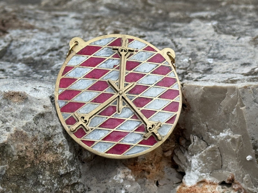 Order of Defense medallion on a lozengy field